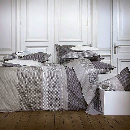 Alexandre Turpault Galante Percale Bedding is 100% Egyptian cotton and includes a duvet, flat sheet and shams.