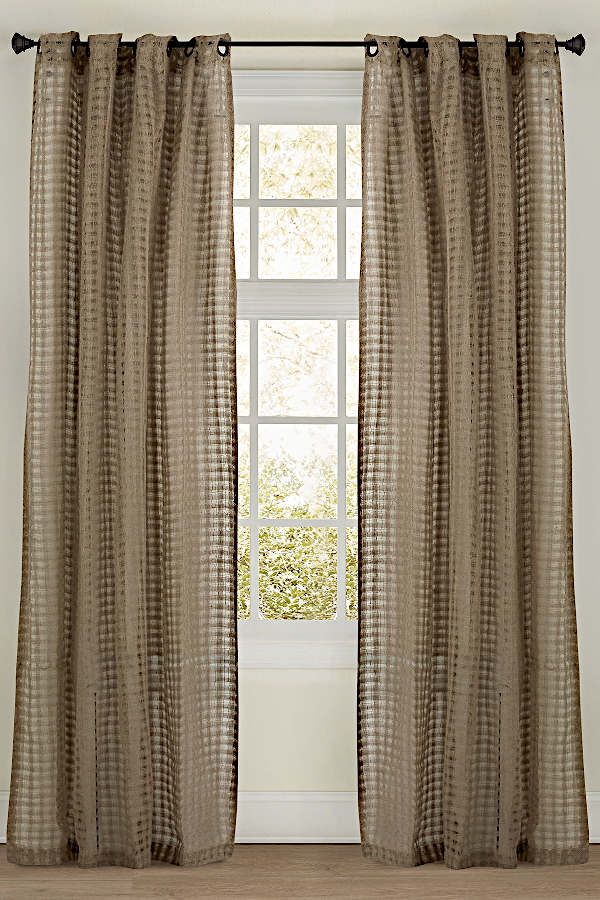 Emdee International presents this sheer drapery with a check pattern.