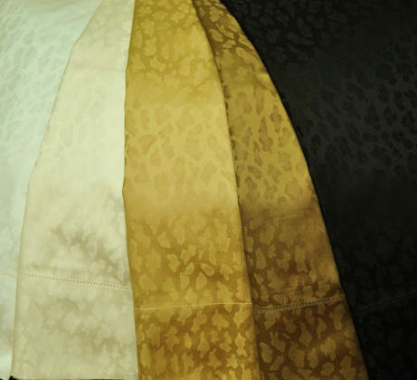 Home Treasures Jaguar Bedding is 100% Egyptian Cotton Sateen and includes a duvet, flat sheet, shams, dust ruffle.