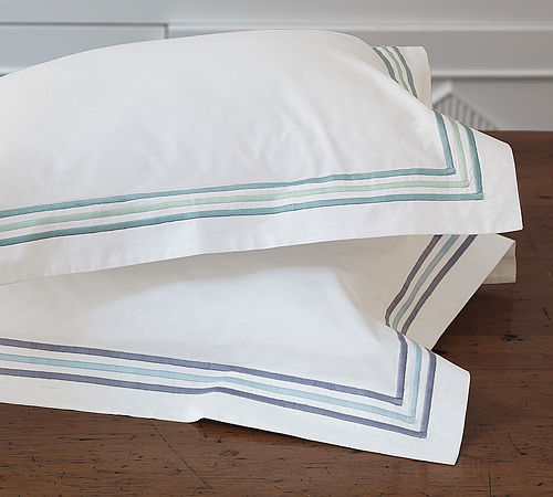 Nancy Koltes Ritz Bedding is available in Heather or Lagoon.