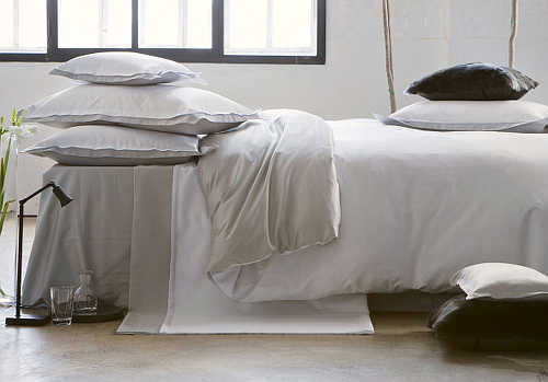 Alexandre Turpault Comedy Bedding includes a duvet, flat sheet, shams.