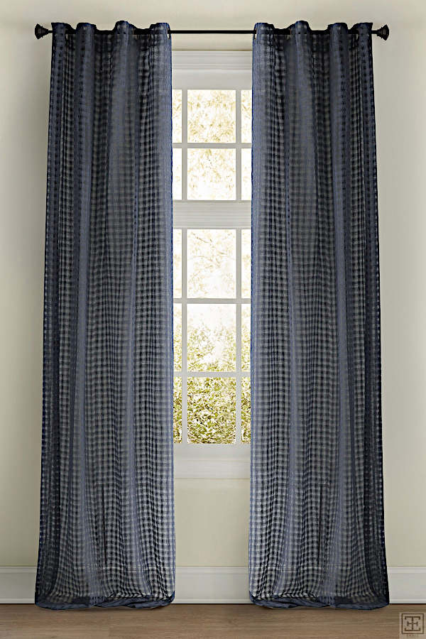 Emdee International presents this sheer drapery with a check pattern.