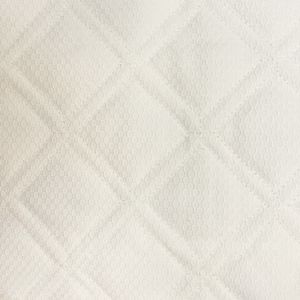 Home Treasures Linens Triad - Embroidered Bedding Close-up - Honeycomb Quilted Ivory.