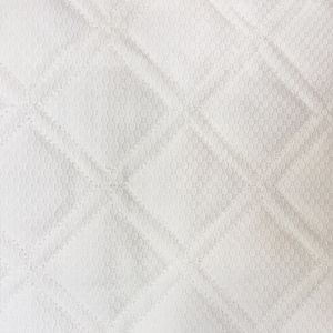 Home Treasures Linens Triad - Embroidered Bedding Close-up - Honeycomb Quilted White.