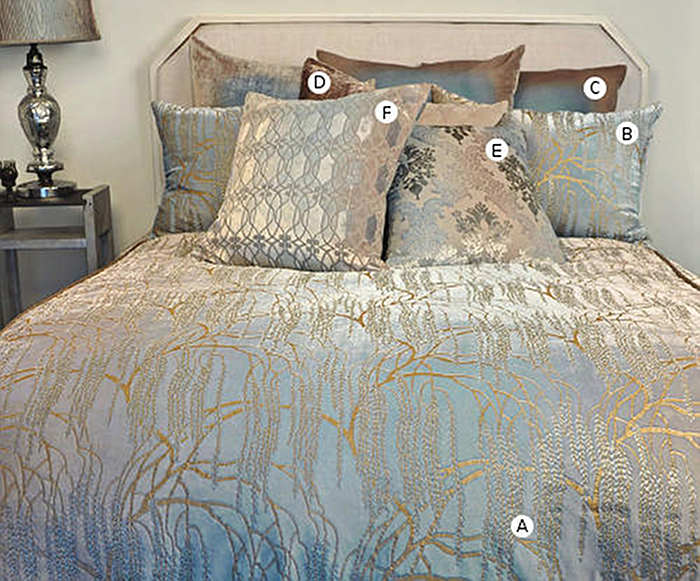 Kevin O'Brien Studio Metallic Willow Bedding includes a duvet, pillow shams, and decorative pillows.